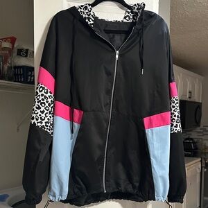 Stylish Black and Pink Women's Jacket. ( has chinch strings on the side.)